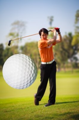 Golfer Hitting Golf Ball